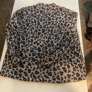 Maurice’s leopards print ribbed mock turtleneck top.